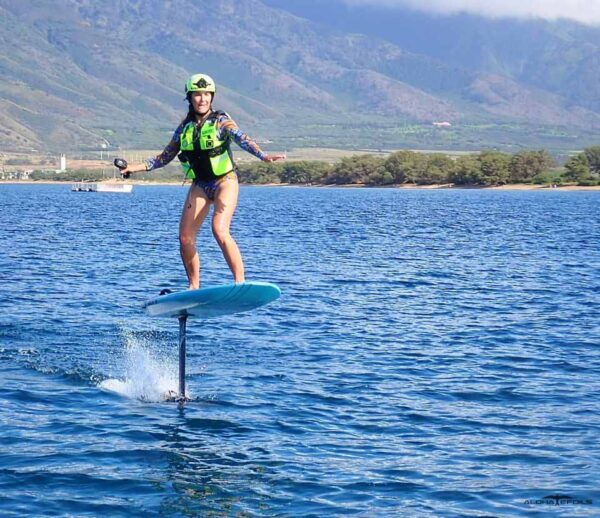 a person riding a surf board on a body of water